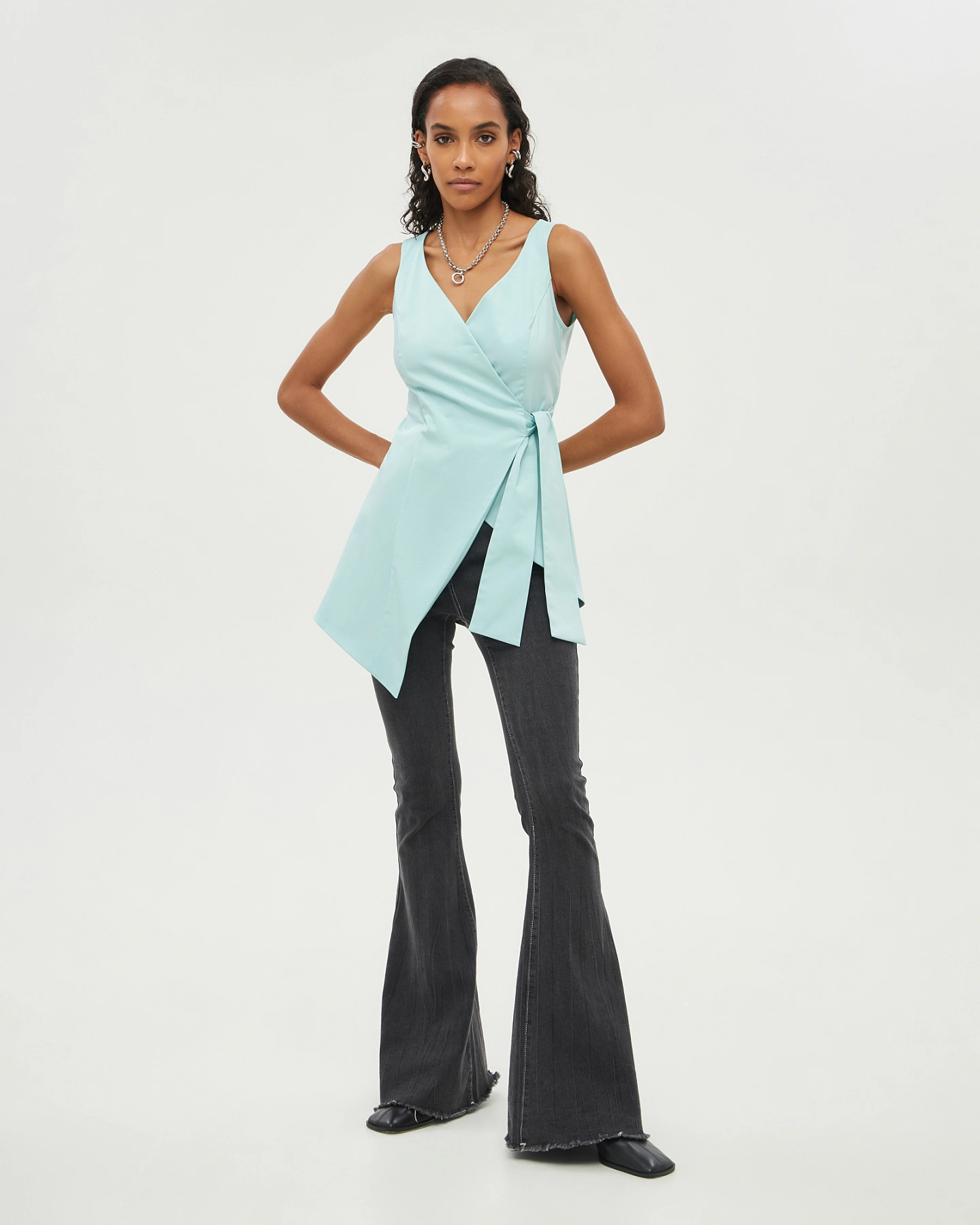 Asymmetric hem top