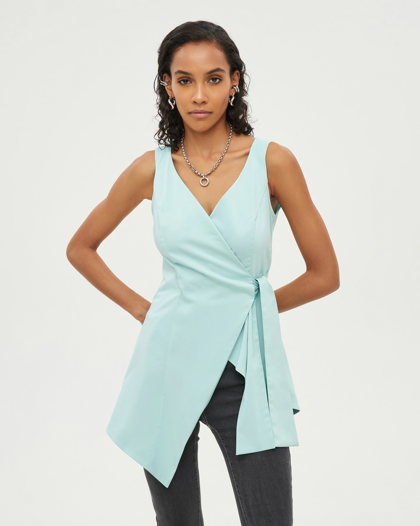 Asymmetric hem top