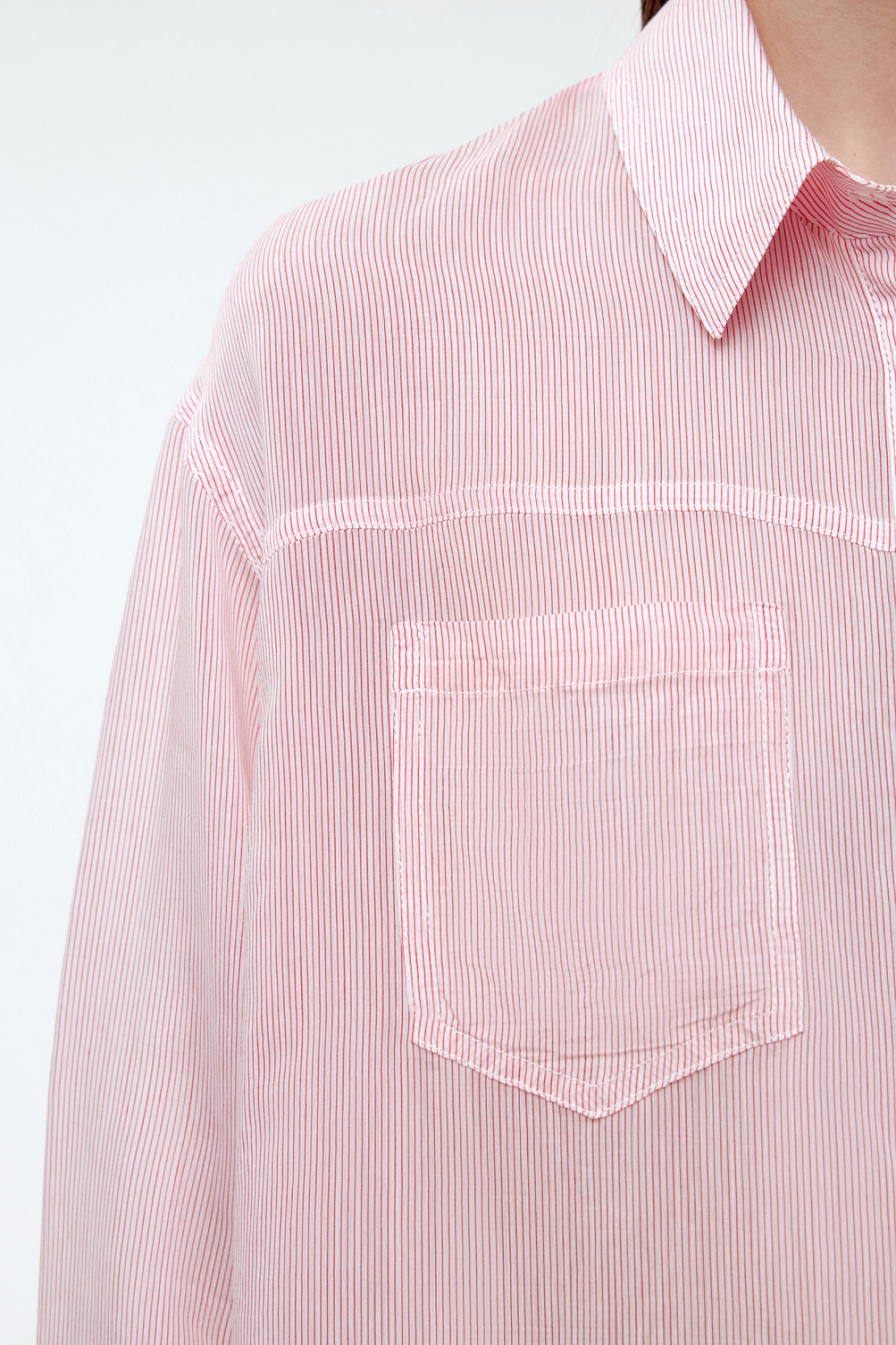 Shirt with dropped shoulder and yoke