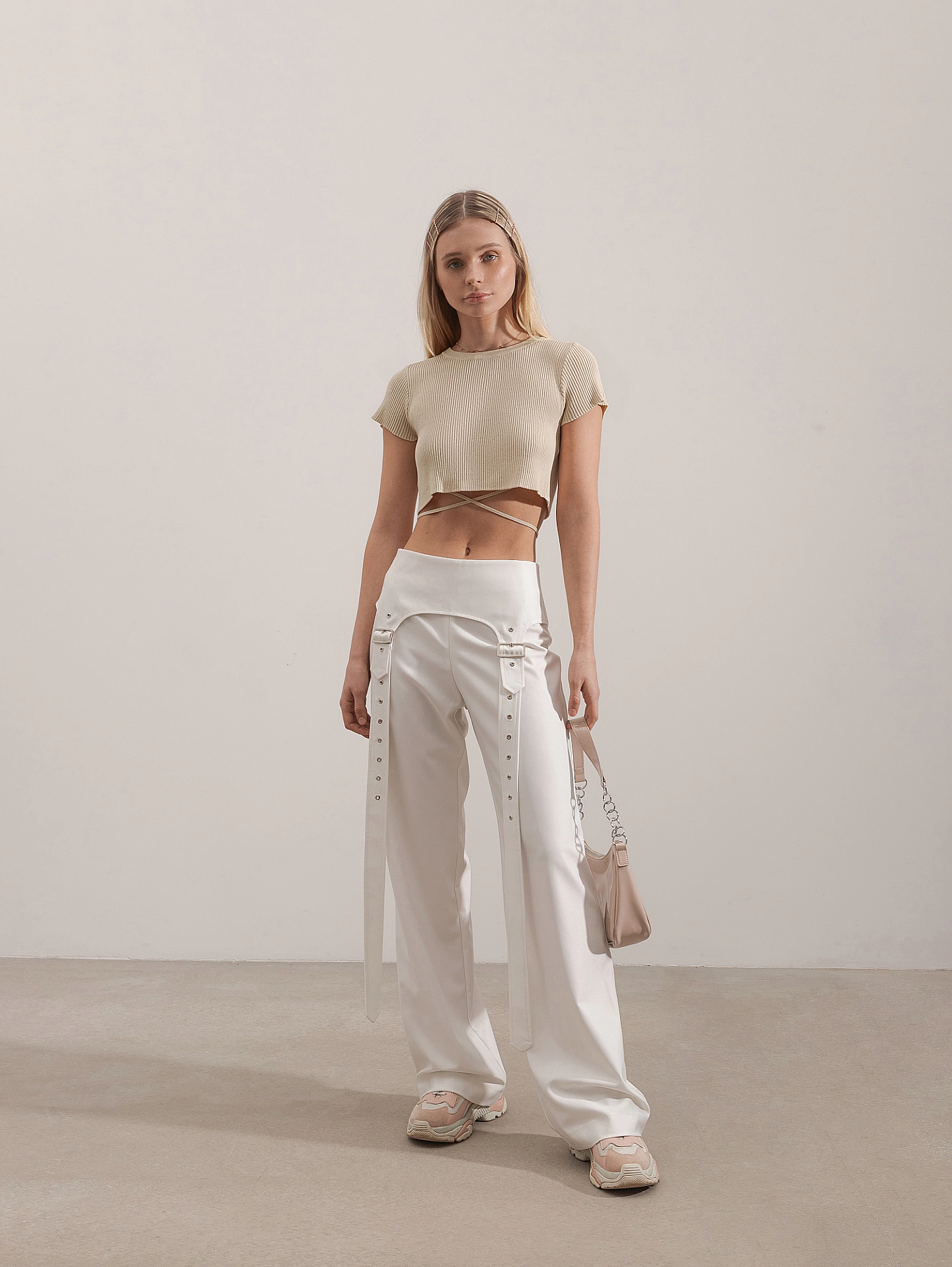 Брюки с хлястами