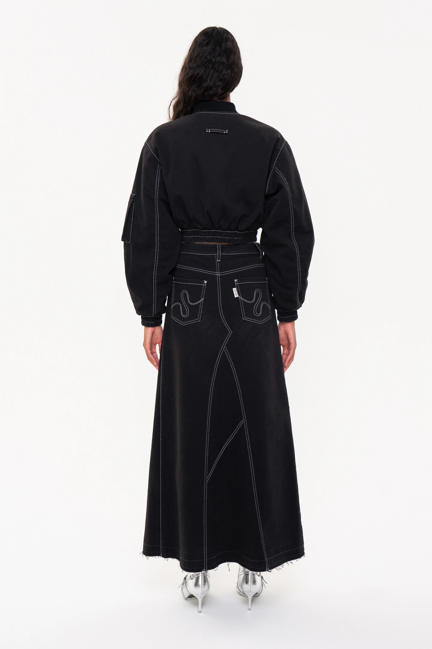 Short bomber jacket with wide sleeves  and a denim maxi skirt