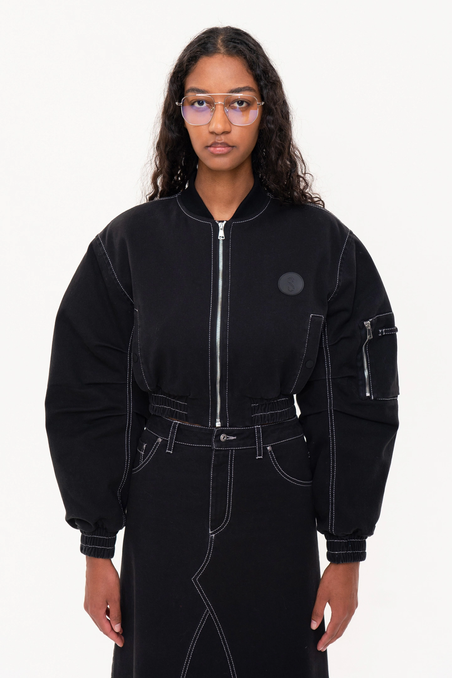 Short bomber jacket with wide sleeves  and a denim maxi skirt