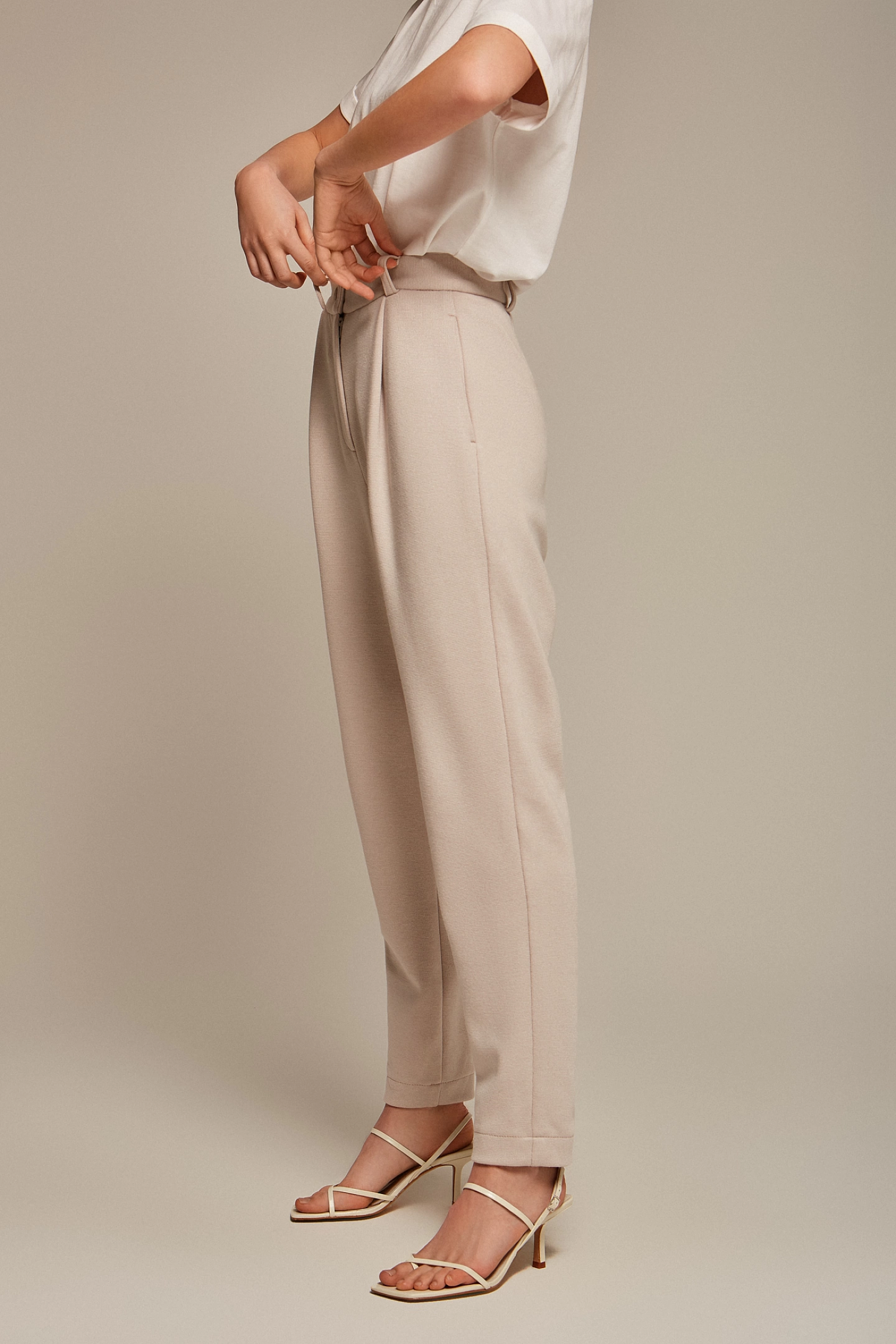 Брюки с защипами