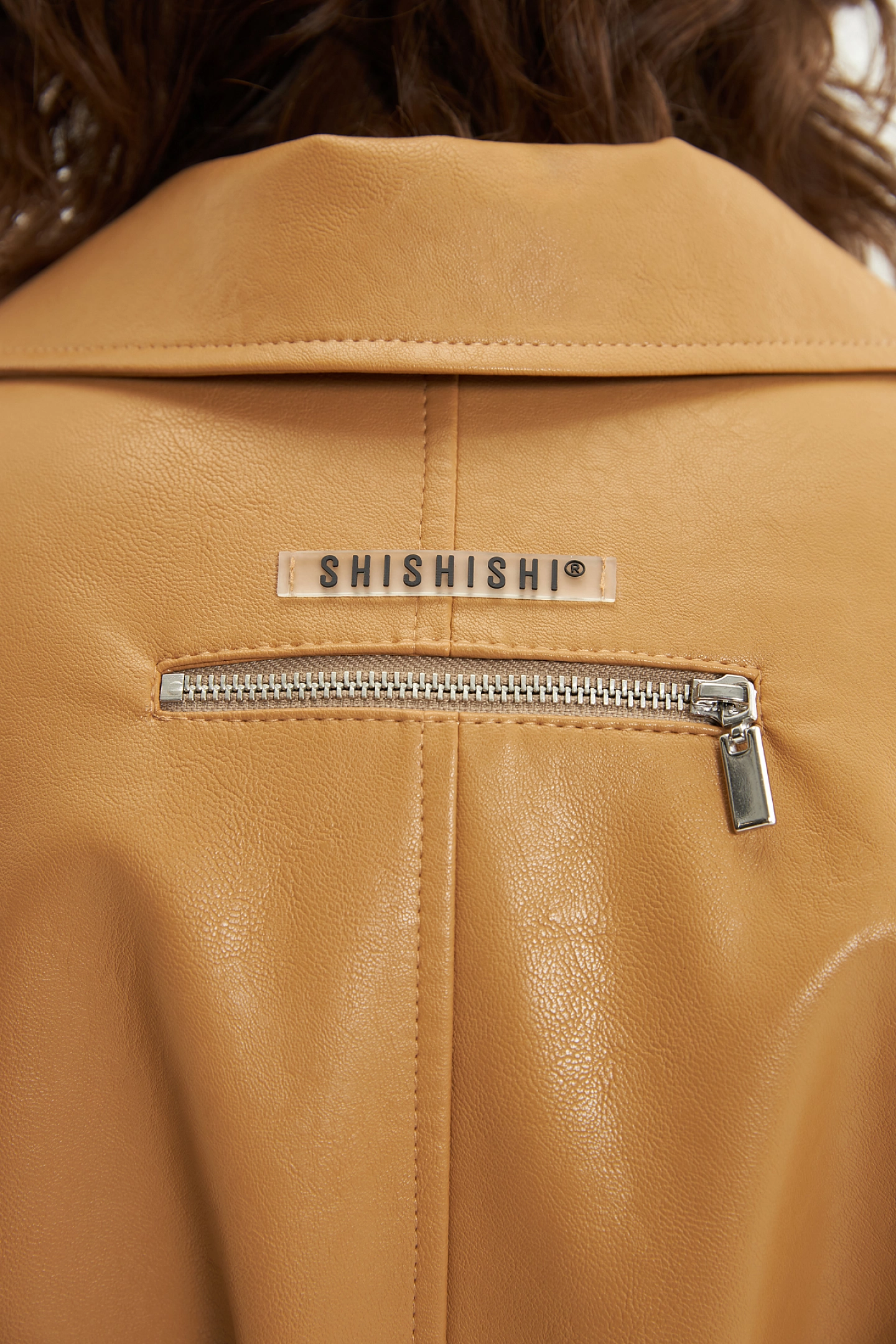 Warmed eco-leather coat