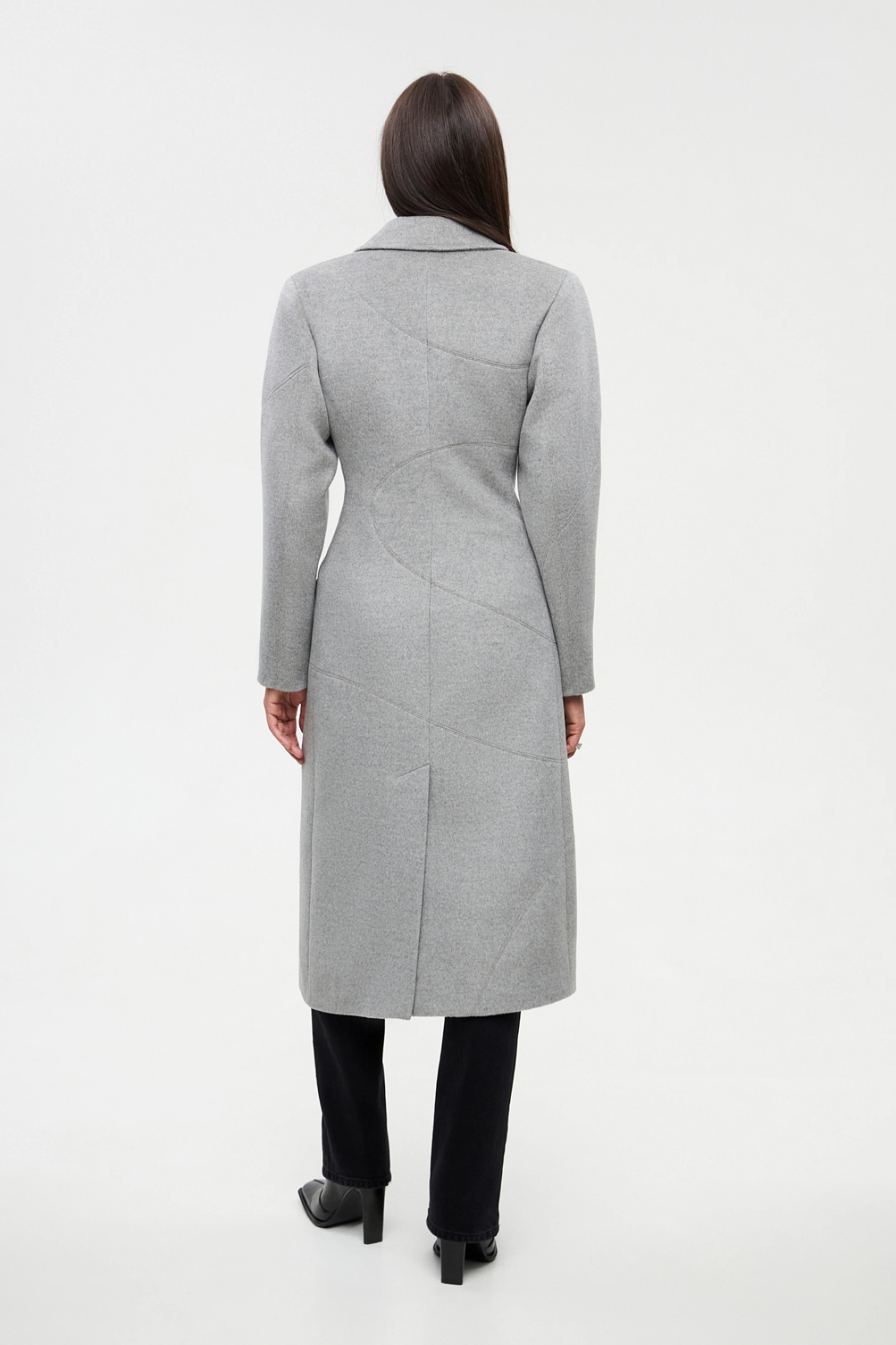 Coat with decorative seams