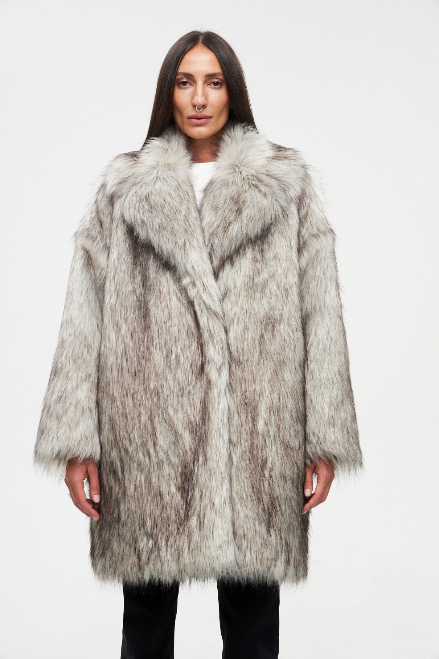 Double-breasted fur coat with a lowered shoulder