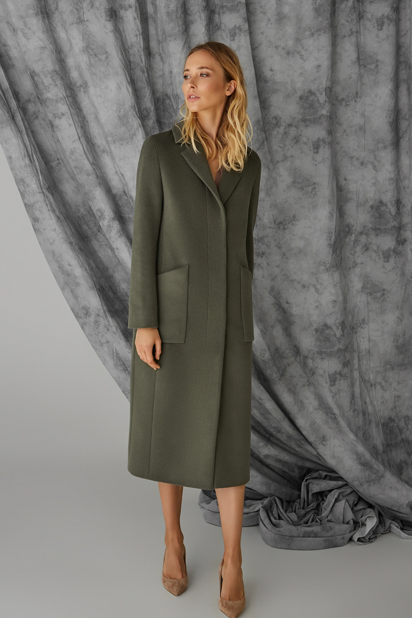 Пальто с супатой и фигурными карманами