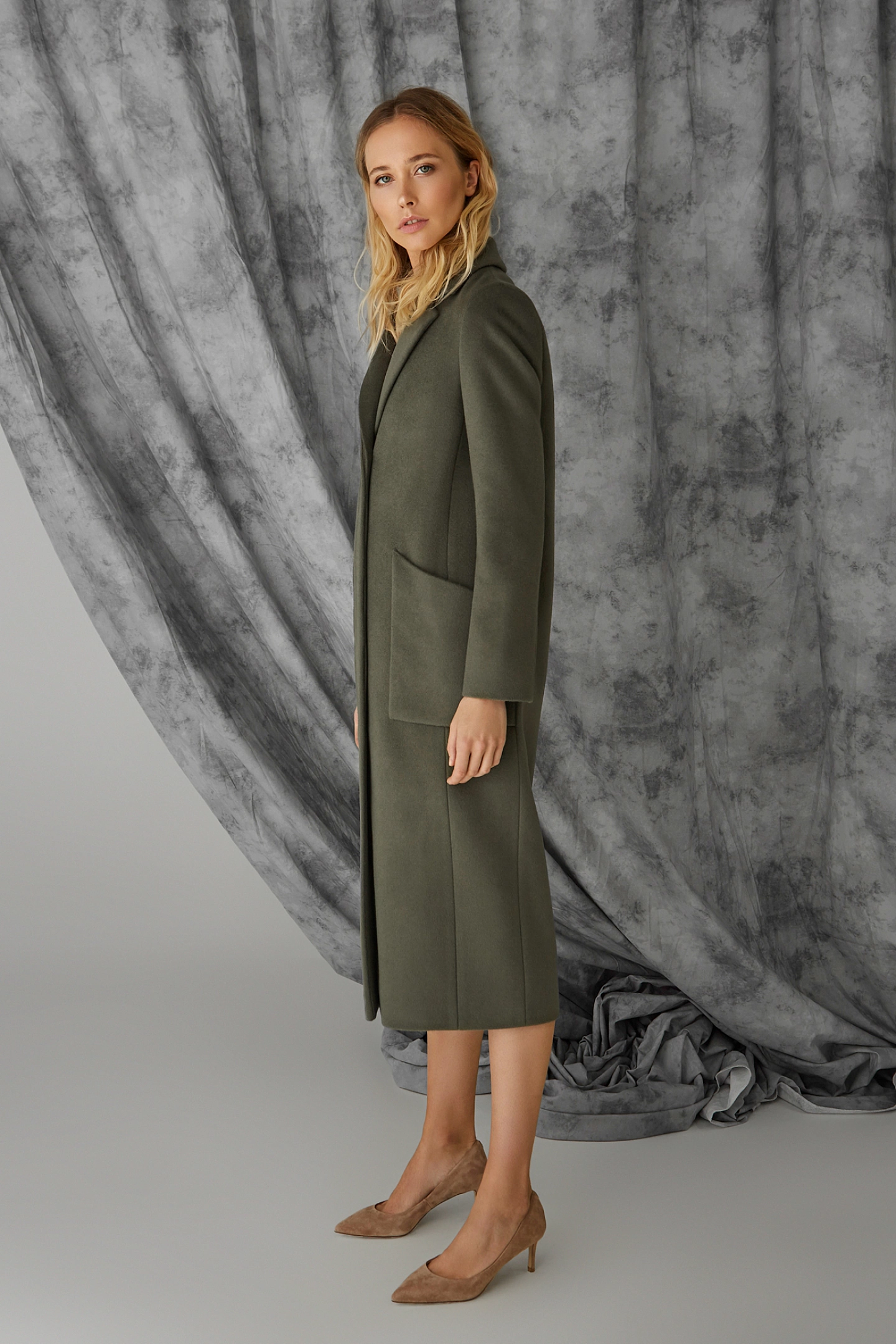 Пальто с супатой и фигурными карманами